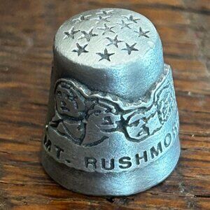 vintage pewter thimble featuring Mt. Rushmore in South Dakota, signed by Nichola